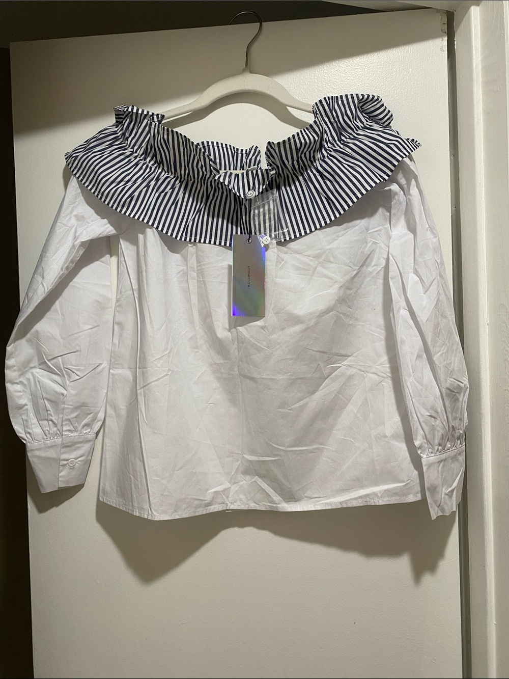 Off-Shoulder White Blouse with Navy Stripe Ruffle Collar